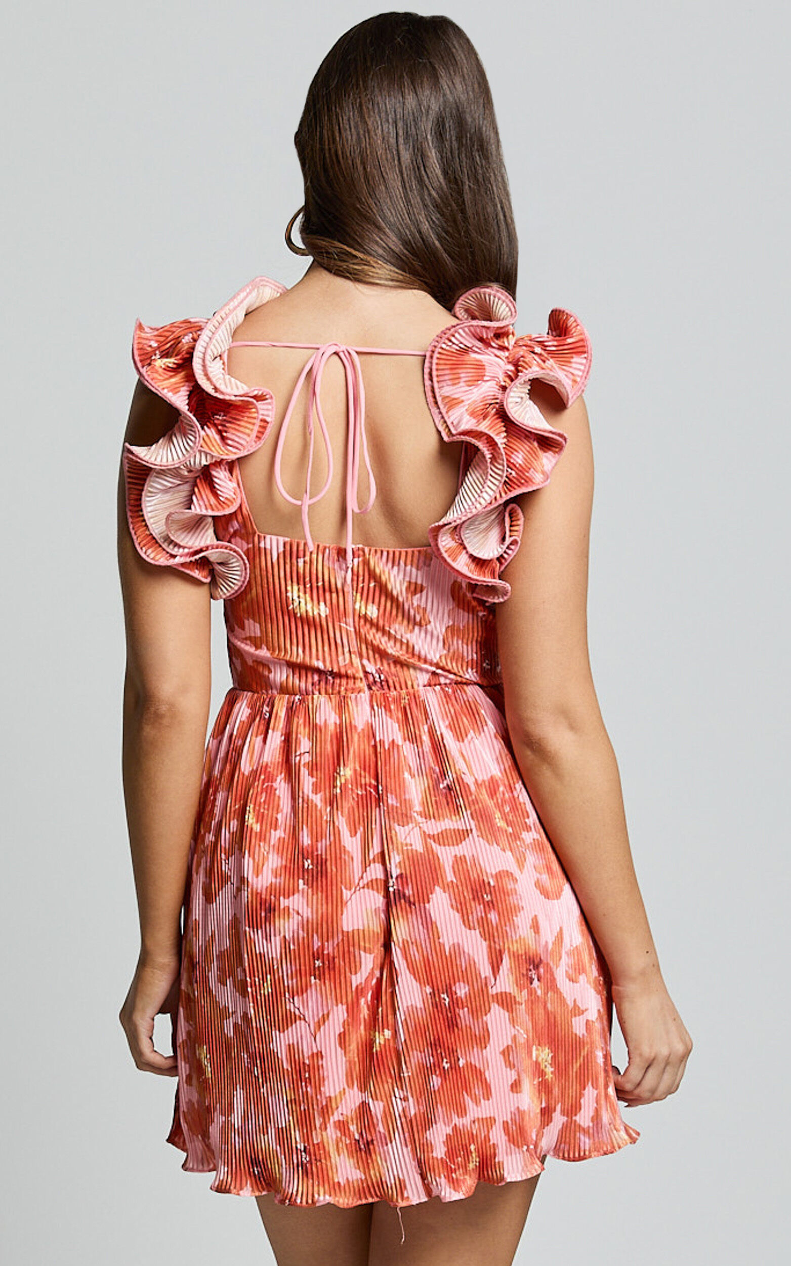 Carol Mini Dress - Pleated Fabric With Ruffle Trims Dress in Orange Floral Print
